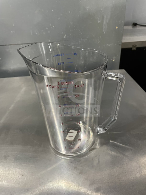 Cambro 2 Qt. Measuring Cup, Model 200MCCW135, clear plastic with measurement markings in red and blue, new condition.