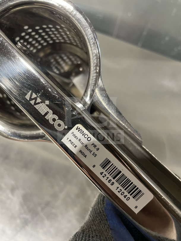 Winco PR-9 stainless steel potato ricer, new condition, model PR9, commercial-grade, barcode SN: 842169120409.