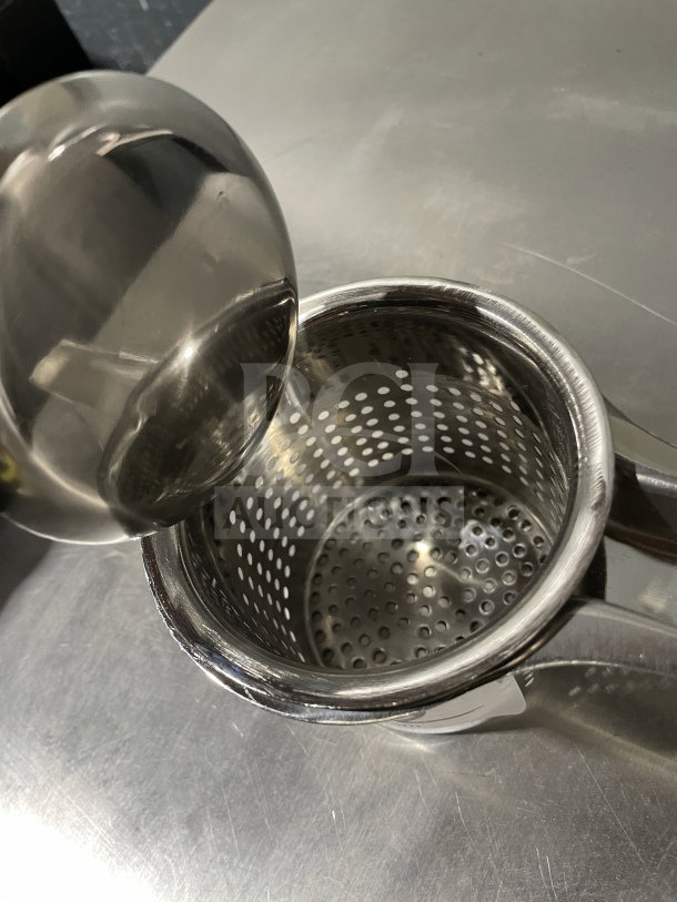 Winco PR9 commercial stainless steel potato ricer, new condition, round shape, perforated design, SN: 842169120409.