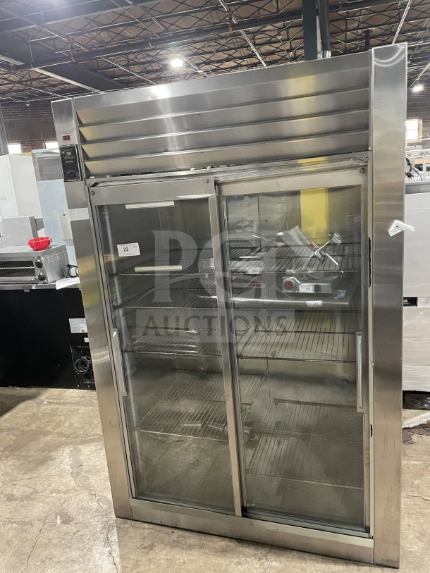 Traulsen stainless steel double glass door reach-in refrigerator, Model RHT232NUTSL012, with chrome plated racks, 115V.