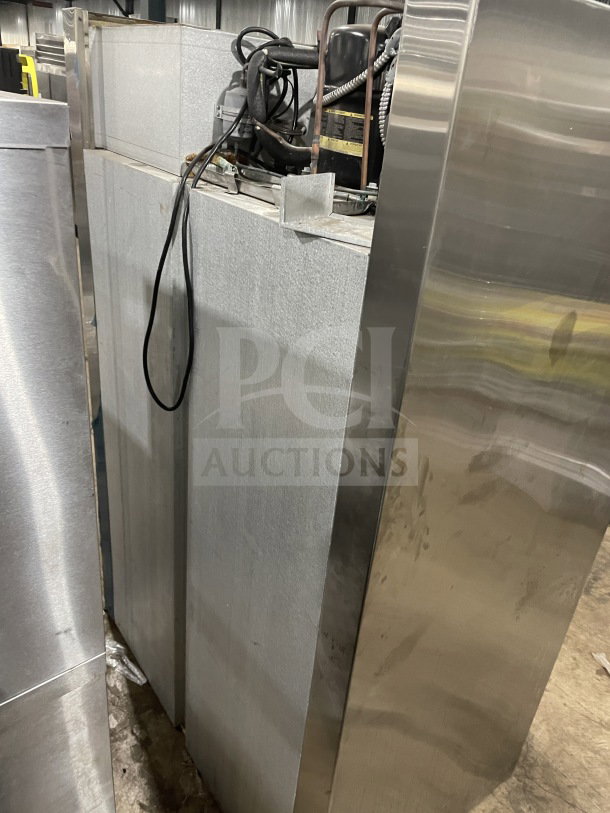 Traulsen stainless steel double glass sliding door refrigerator, model RHT232NUTSL012, with chrome racks, 115V, commercial use.