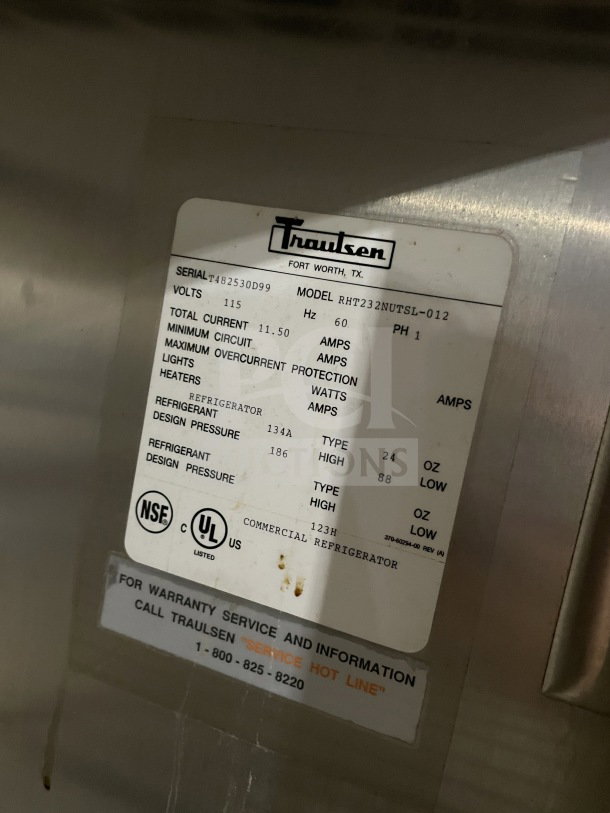 Traulsen stainless steel double glass sliding door refrigerator, model RHT232NUTSL012, with chrome plated wired rack. Serial T482530D99.