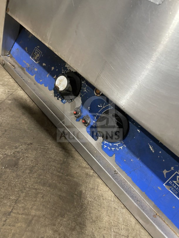 Bakers Pride P18 stainless steel countertop pizza oven, single chamber, double deck, visible wear.