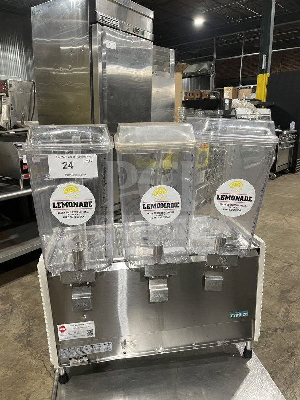 Crathco D354 beverage machine with three hoppers, stainless steel base, on legs, model number and serial number visible.