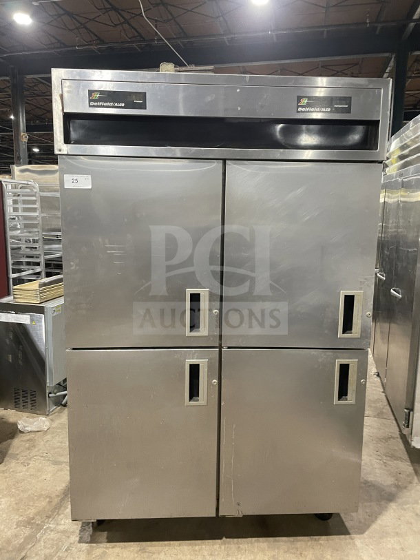 Delfield/Alco commercial stainless steel 4-door dual-zoned refrigerator on casters, featuring poly-coated wire rack, with visible brand logo.