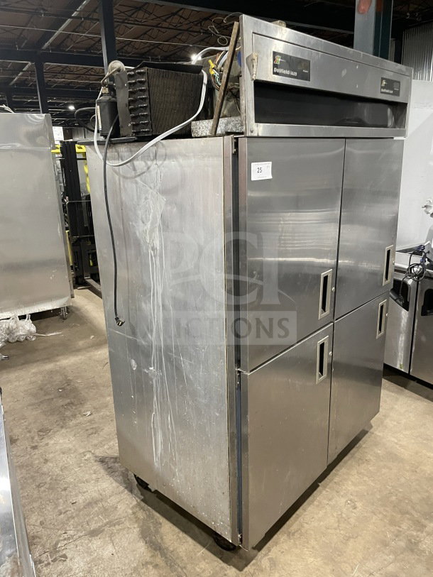 Delfield/Alco stainless steel 4-door dual-zoned refrigerator on casters, includes poly coated wired rack, used condition.