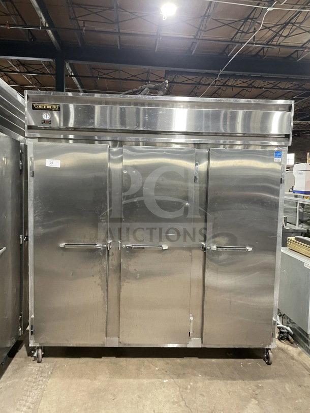 Continental 3F 3-door stainless steel reach-in freezer, Energy Star certified, with poly coated rack, on casters, model SN: 15127134.