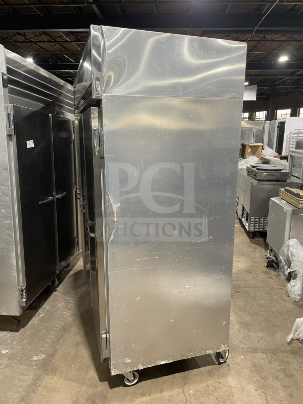 Continental 3F stainless steel 3-door reach-in freezer, Energy Star, on casters, poly coated wired rack, SN: 15127134.