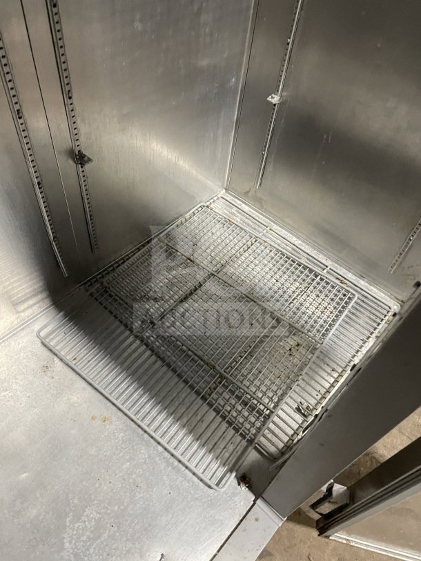 Continental Commercial 3-Door Stainless Steel Freezer interior with poly-coated wired rack. Model 3F. Energy Star certified.