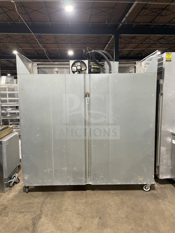 Continental 3F commercial stainless steel 3-door reach-in freezer, Energy Star certified, on casters, model SN: 15127134.