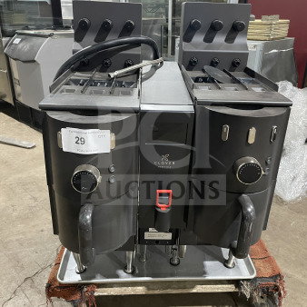 Clover CM9700 Vertica Series commercial coffee brewer, 6 flavor hoppers, on legs, 208V, serial E311353, used condition.