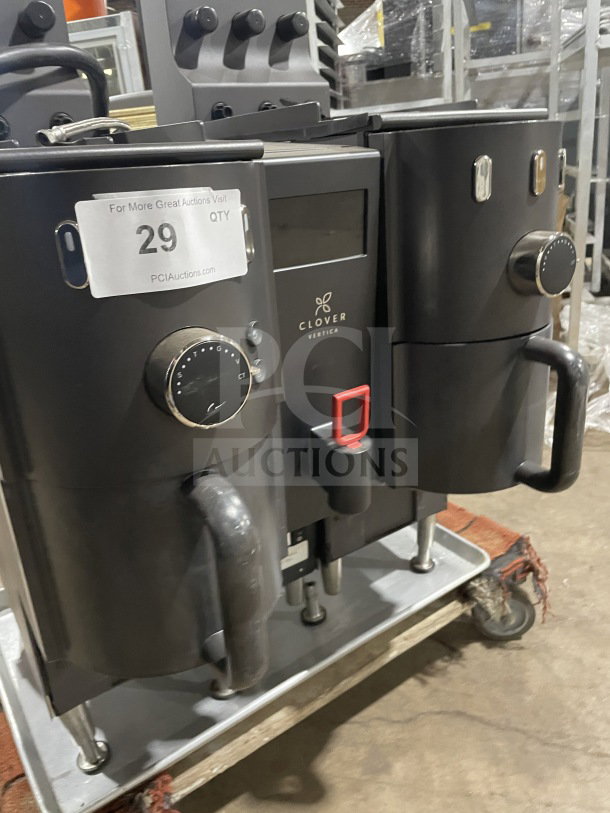 Clover Vertica Series CM9700 commercial coffee brewer, 6 flavor hoppers, 208V, mounted on legs, serial E311353, good condition.