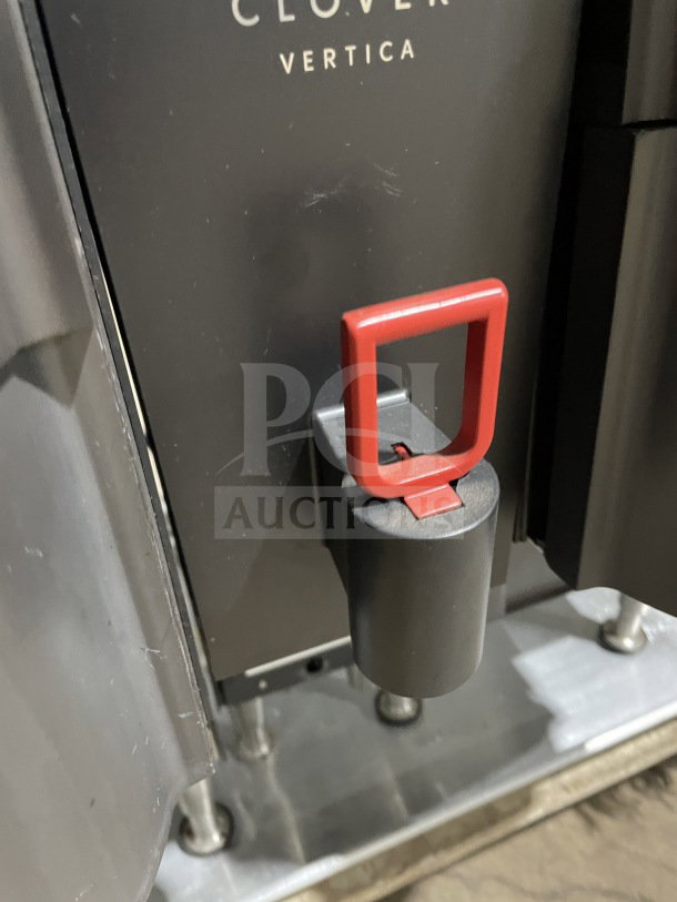 Clover Vertica Series CM9700 commercial coffee brewer with red handle, on legs, 6 flavor hoppers, 208V, SN: E311353.