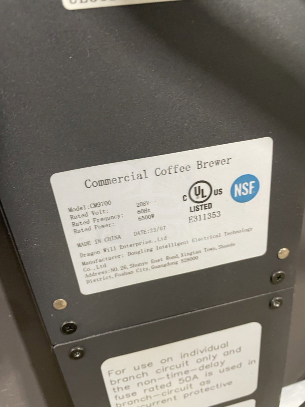 Clover CM9700 commercial coffee brewer with 6 flavor hoppers, on legs, 208V. Serial E311353, UL and NSF listed.