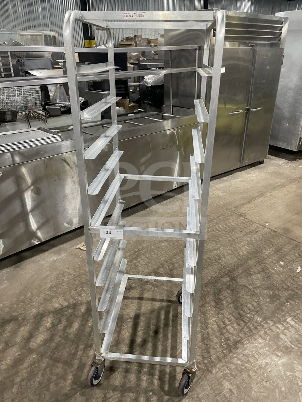 Kelmax by SPG stainless steel end load mobile bun/sheet pan rack with wire slides and casters. Model: Channel.