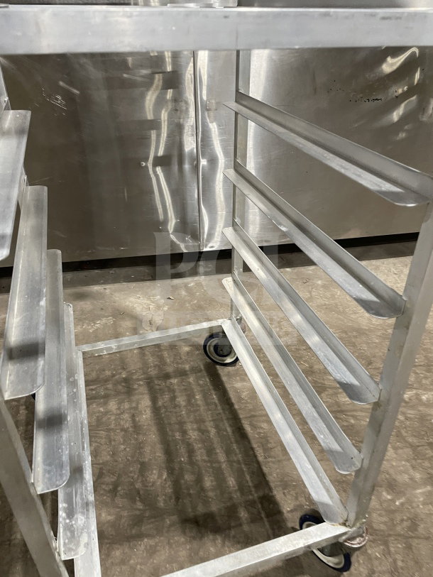 Kelmax by SPG commercial stainless steel end load bun/sheet pan rack with wire slides, on casters, by Channel.