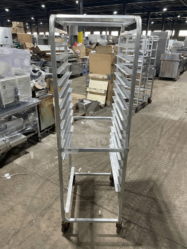 Commercial stainless steel heavy-duty sheet pan rack on casters, 20 slots, durable construction, ideal for bakers.