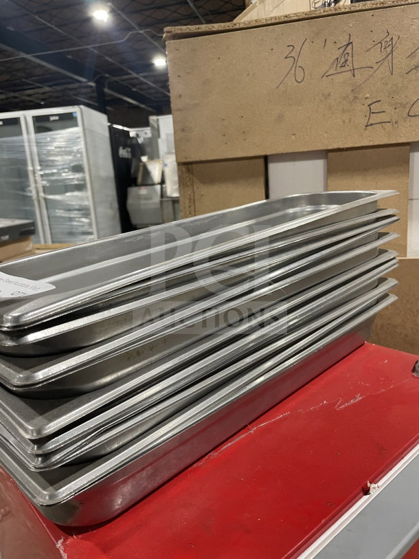Winco commercial stainless steel full-size hotel pans stacked, excellent condition, auction lot.
