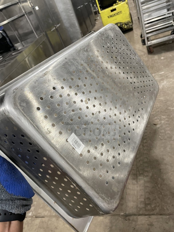 Choice Commercial Stainless Steel 2-1/2" perforated steam pan, durable design, minor wear, barcode tag visible.