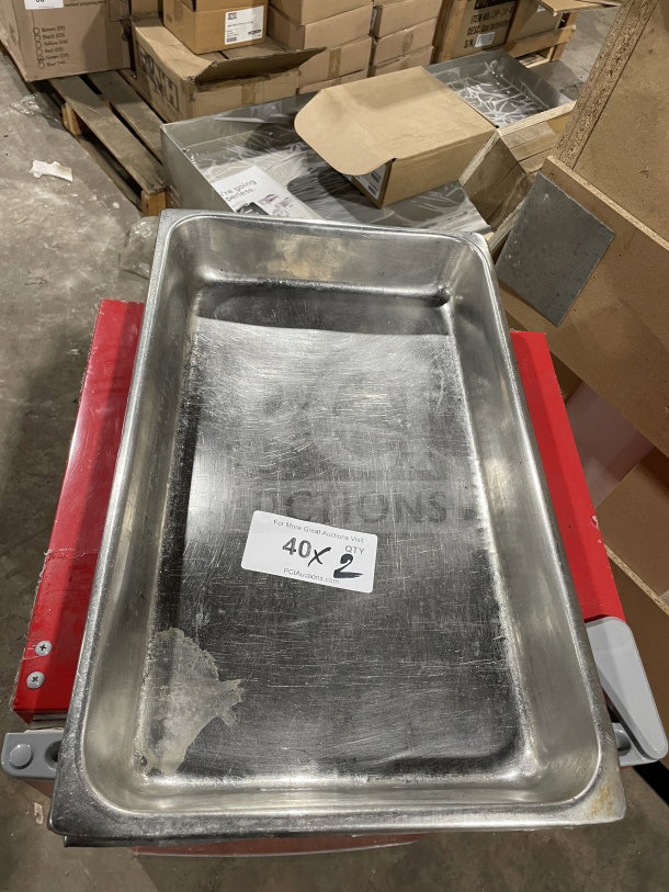 Commercial heavy-duty stainless steel anti-jam full-size steam table pan, used condition, marked "40X2" for auction.
