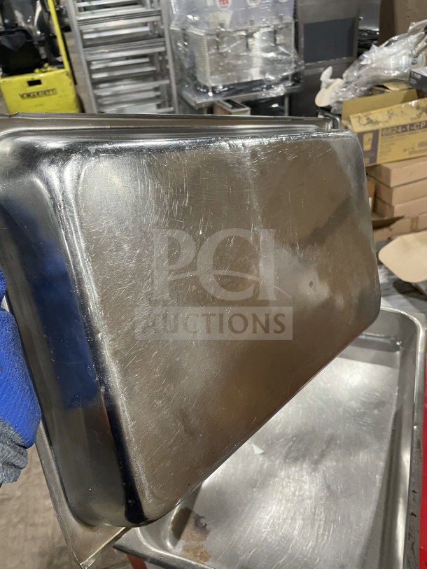 Commercial full-size stainless steel steam table pan, anti-jam, heavy-duty, used condition, ideal for hotel food service.