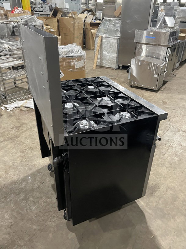 Commercial stainless steel 6-burner gas range/oven with backsplash, overhead salamander shelf, wired oven rack, on casters.