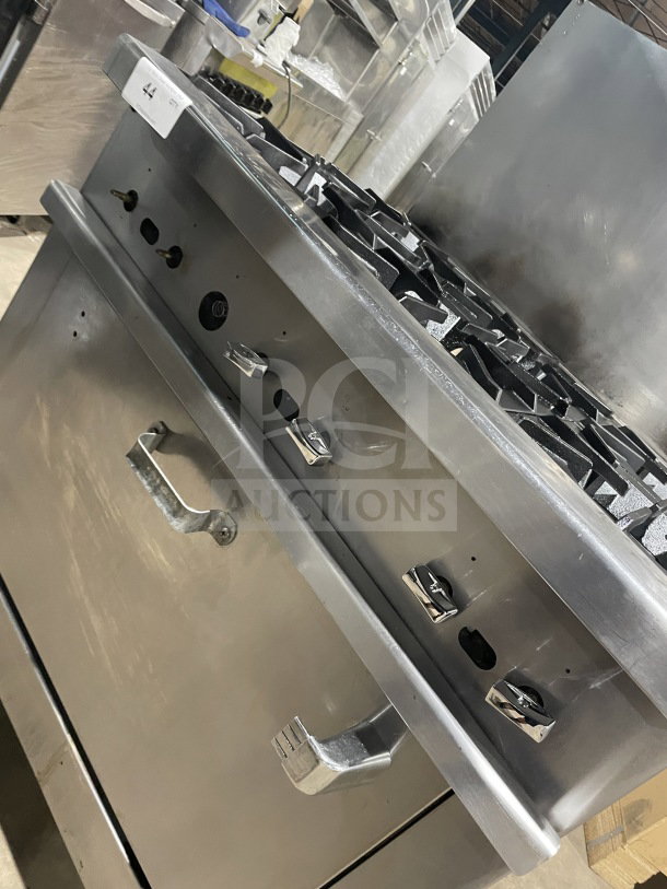 Commercial stainless steel 6-burner gas range/oven combo with back splash, overhead salamander shelf, wired oven rack, on casters.