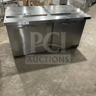 Continental Stainless Steel 2-Door Refrigerated Prep Table, Model SW72 18. Includes wired rack. Serial: 159B8977. Good condition.