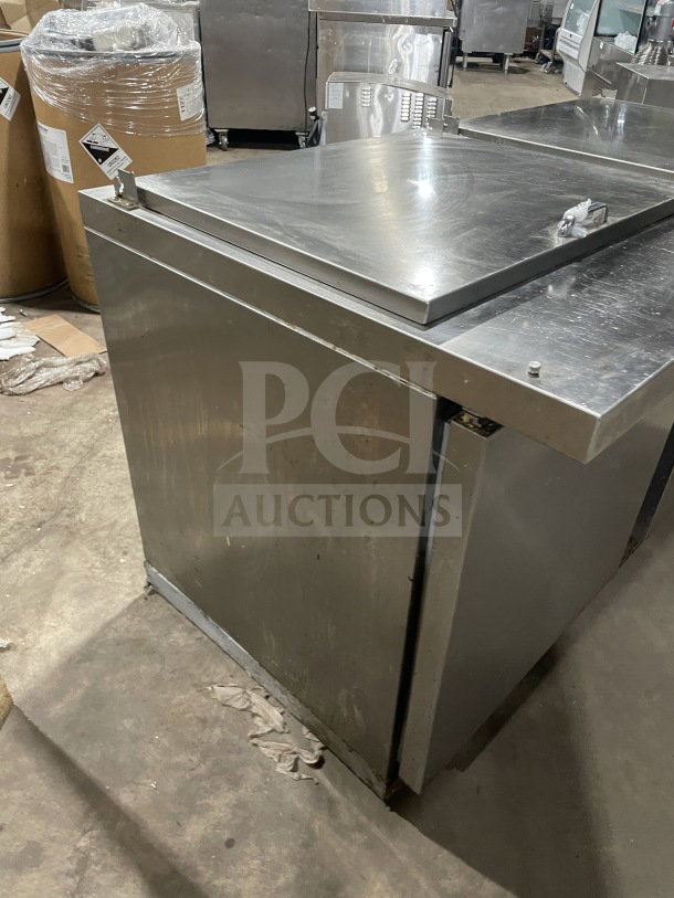 Continental SW72 18 stainless steel prep table, two-door, refrigerated, includes wired rack, 115V 1 Phase, used condition.