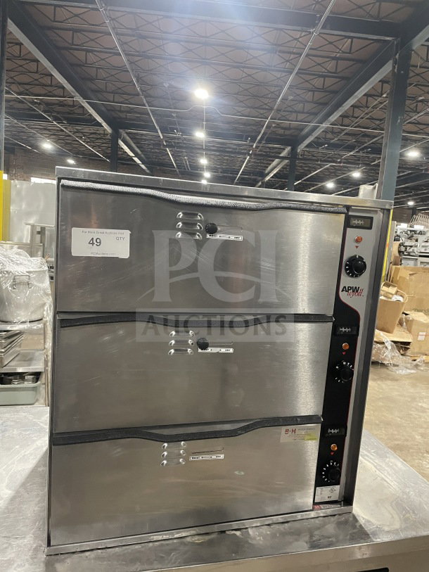 APW Wyott HDD-3 stainless steel 3-compartment heated drawer. Individual controls, electric 120V, light wear. Model HDD-3.