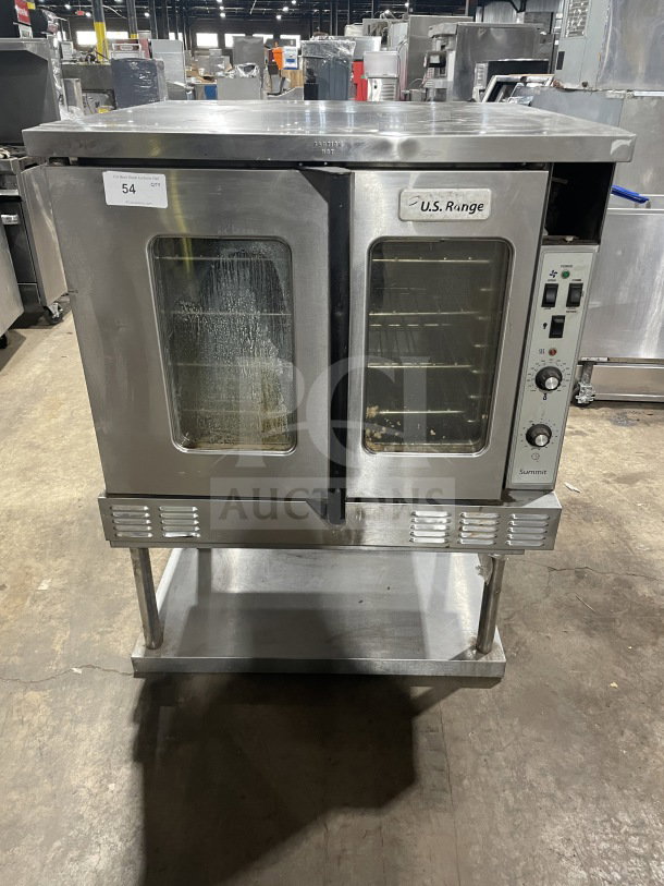 US Range SUMG100 stainless steel single deck convection oven with view-through doors, on equipment stand with storage.