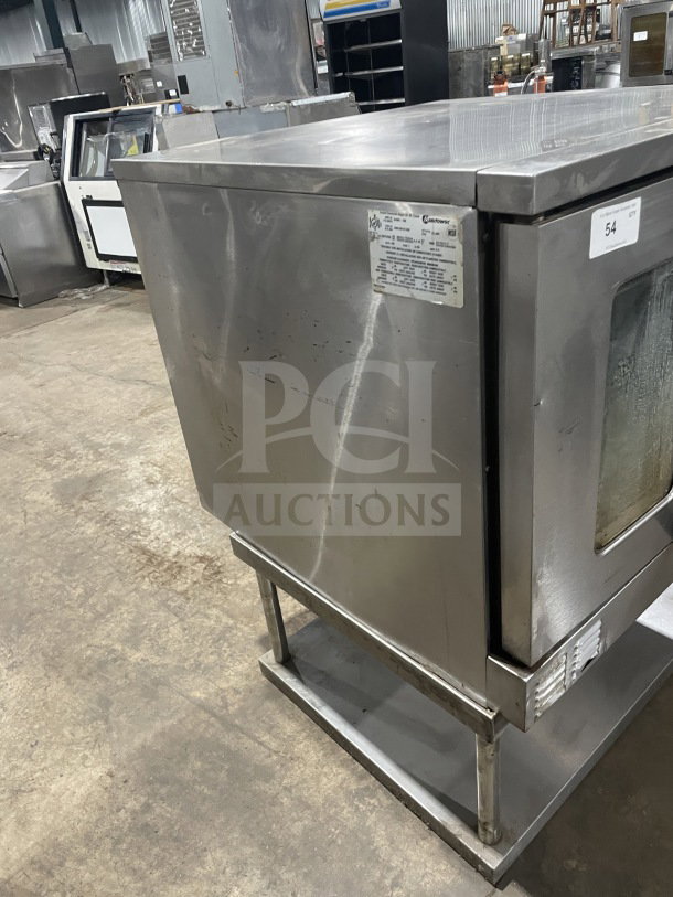 US Range SUMG100 stainless steel convection oven with view-through doors, oven rack, equipment stand, and storage space.