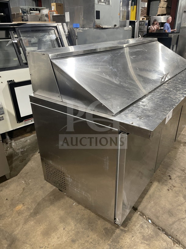 Commercial Stainless Steel 3-Door Prep Refrigerator, Model SC-72-BMI, on casters, with poly coated rack, in good condition.
