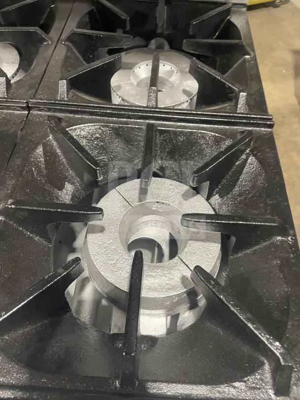 Bakers Pride 6-burner range with iron grates, model 36BP6BS30N, in excellent condition.