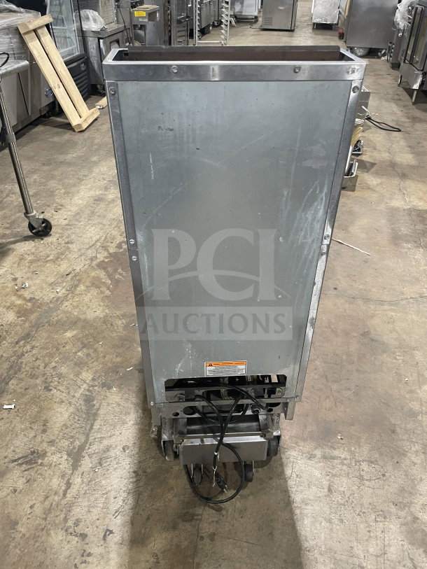 Pitco SFSG14 JS stainless steel 40 lb. deep fat fryer with filtration system, natural gas, casters, back view.