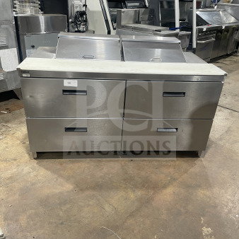 Delfield Manitowoc stainless steel 4-drawer sandwich prep table, model UCD4464N-12-DD5, with cutting board. 115V, 1 phase.