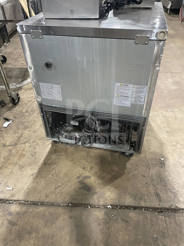 Turbo Air EUR-28-N6 commercial stainless steel undercounter refrigerator with poly-coated wired rack, on casters, 115V.