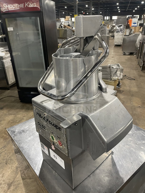 Robot Coupe CL52 Commercial Food Processor, stainless steel, full moon pusher, 2 discs, 2 hp, 120V, used condition.