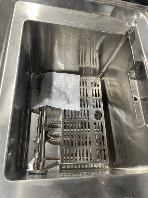 Omcan Model 41882 stainless steel electric pasta cooker with mesh basket holder, 240V, countertop design, used condition.