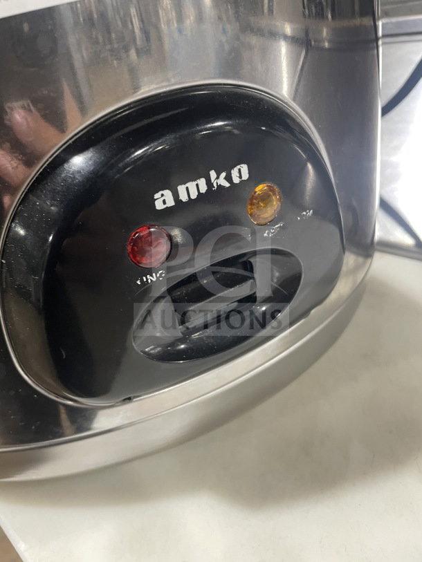Amko Stainless Steel Electric Rice Cooker, Model AK-50RC, 120V, with indicator lights and Amko logo.