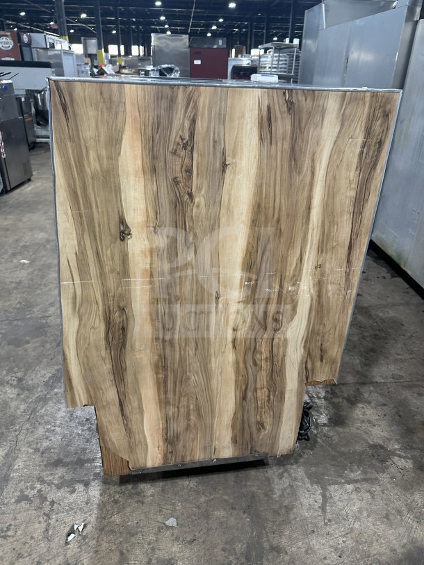 Marc SQBCR-59 wooden style multi-tier bakery display case with flat glass, rear sliding doors, and poly-coated rack.