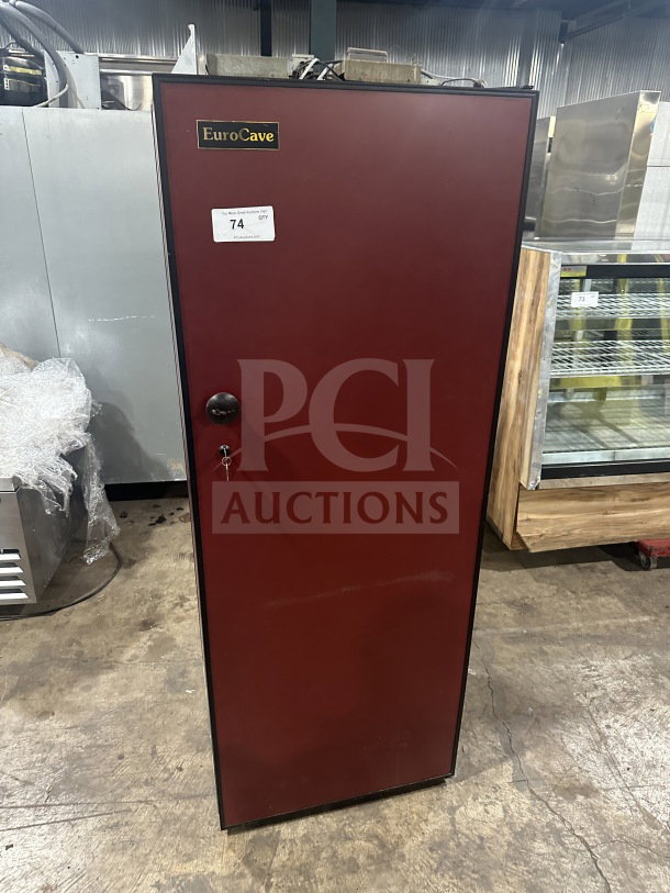 EuroCave Vieillitheque Confort wine cooler, Model V-264W, red solid single door, with wooden retractable shelves.