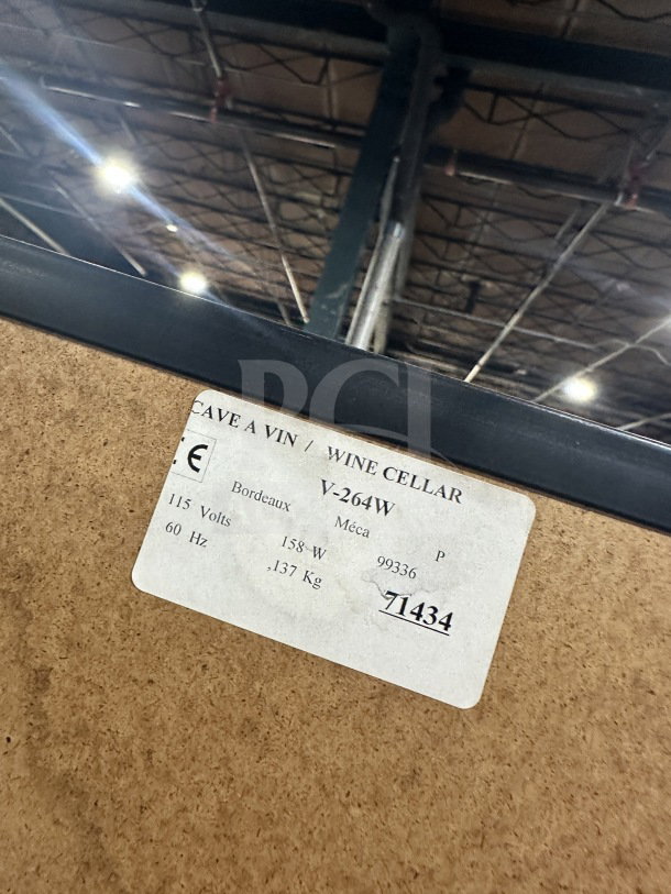 EuroCave V-264W wine cooler label showing model, serial number 71434, and power details: 115V, 158W, 137kg.