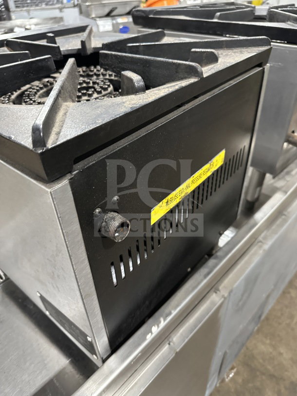 ACE Commercial Stainless Steel Natural Gas Stove, Model CTSP-1\NG. Features durable burners, good condition, with label on side panel.