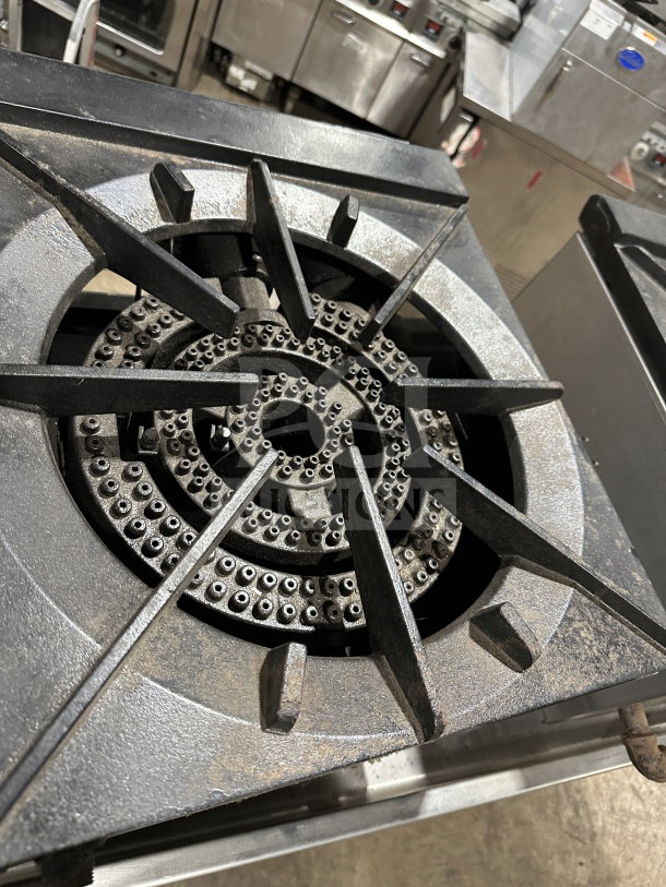 ACE Commercial Stainless Steel Natural Gas Stove, Model CTSP-1/NG. Features heavy-duty cast iron grates. Signs of use visible.