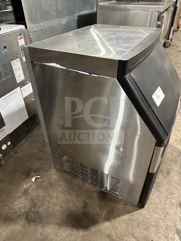 Avantco stainless steel ice machine model 194UC160HA, electric-powered, air-cooled, undercounter design, on legs.