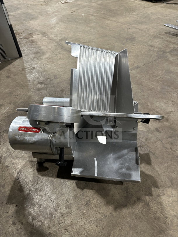 Rare Tor-Rey R-300A electric deli slicer on legs. Commercial-grade, used condition. Features Tor-Rey logo. 115V, 1 phase.