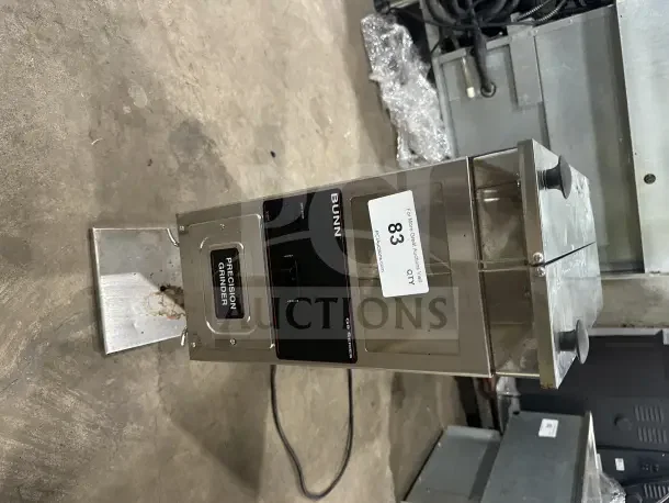 Bunn G9 Series commercial coffee grinder, stainless steel, dual-hopper, electric-powered; features precision grinding controls.