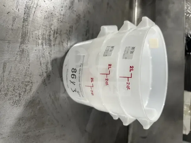 Commercial 2Qt polypropylene food containers, translucent white, stackable, new condition, marked 2L/2qt.