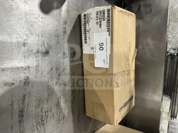Cardboard box containing Cambro 13" red solid deli/salad bar serving spoon, model SPO13CW404, new condition.